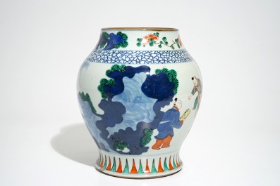 A Chinese olive-shaped wucai vase with figures, 19th C.