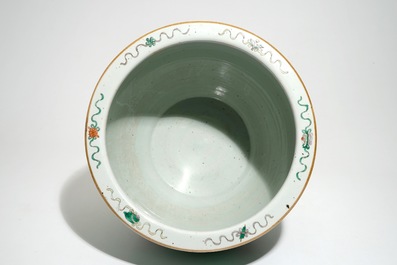 A Chinese famille verte green-ground fish bowl with warriors on horseback, 19th C.