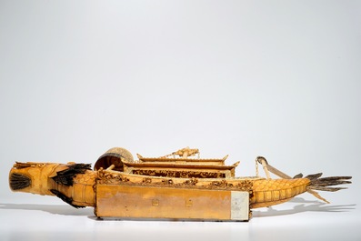 A very large Chinese carved ivory model of a dragon boat, 19th C.