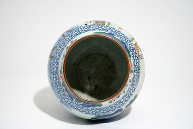 A Chinese olive-shaped wucai vase with figures, 19th C.