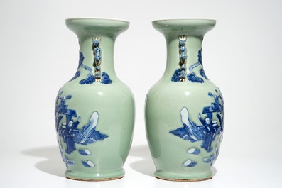 A pair of Chinese celadon-ground vases with blue and white figures, 19th C.