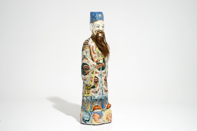 A tall Chinese famille rose figure of an immortal, 19th C.