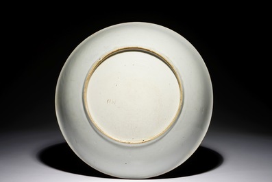 A Chinese famille rose dish with figures in a garden, Yongzheng