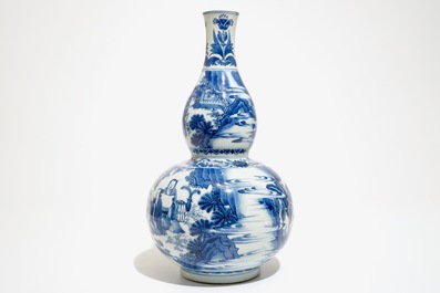 A Chinese blue and white double gourd vase with scholars, Transitional period, Chongzhen