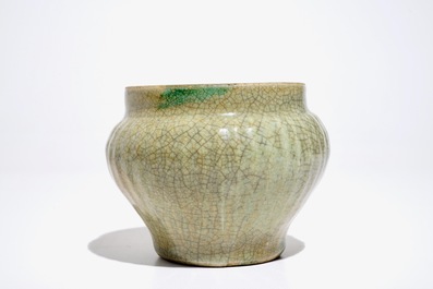 A Chinese Longquan celadon-ground crackle-glazed jar and two dishes, Ming