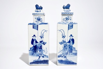 A pair of square Chinese blue and white vases and covers, Kangxi mark, 19th C.