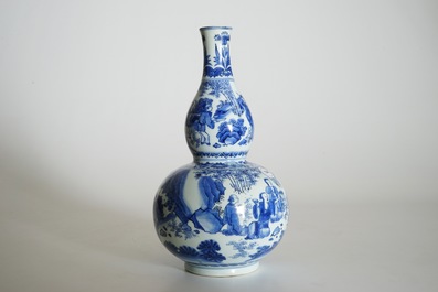 A Chinese blue and white double gourd vase with scholars, Transitional period, Chongzhen