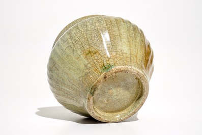 A Chinese Longquan celadon-ground crackle-glazed jar and two dishes, Ming