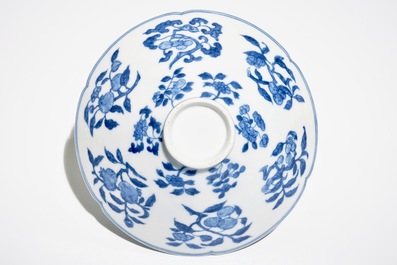 A Chinese blue and white bowl with flowers and fruits, 19th C.