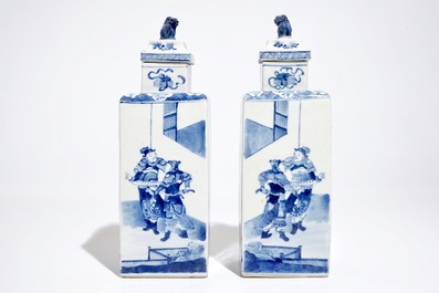 A pair of square Chinese blue and white vases and covers, Kangxi mark, 19th C.