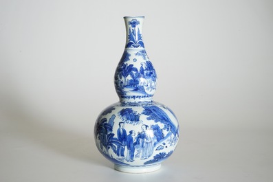 A Chinese blue and white double gourd vase with scholars, Transitional period, Chongzhen