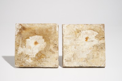 A pair of Dutch Delft mirror-decorated diamond tiles with hares, ca. 1600
