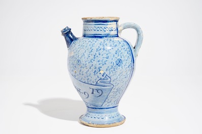 An Antwerp maiolica light blue ground wet drug jar, mid-16th C.