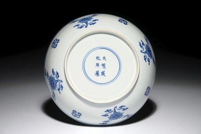 A Chinese blue and white plate with auspicious symbols, Chenghua mark, Kangxi
