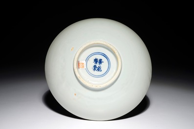 A Chinese blue and white plate with birds in a garden, Shunzhi, Transitional period
