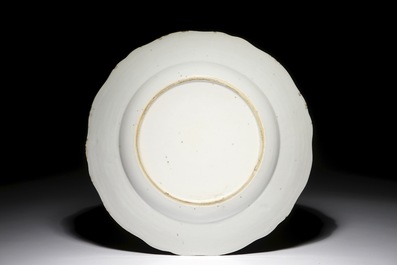 A Chinese export porcelain plate with a fine central scene, Qianlong