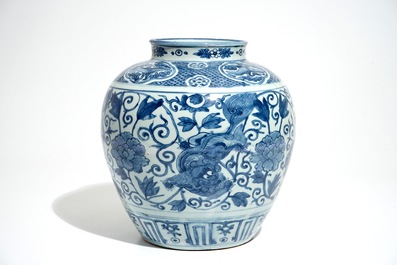 A Chinese blue and white vase with Buddhist lions and peonies, Ming, Wanli