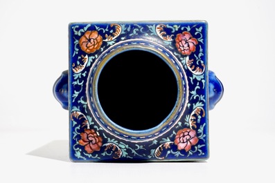 A Chinese famille rose enamelled blue-ground cong vase, 19th C.