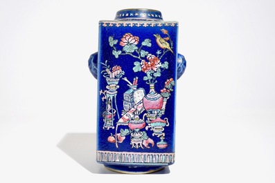 A Chinese famille rose enamelled blue-ground cong vase, 19th C.