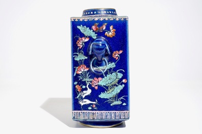 A Chinese famille rose enamelled blue-ground cong vase, 19th C.