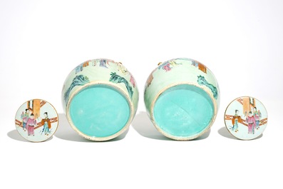 A pair of fine Chinese famille rose jars and covers with a fine design around, 19th C.