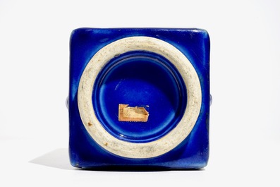 A Chinese famille rose enamelled blue-ground cong vase, 19th C.