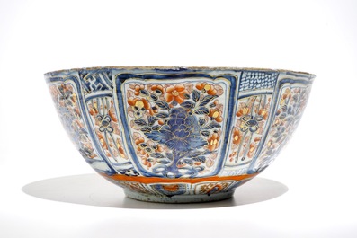 A Chinese clobbered blue and white kraak porcelain bowl with floral design, Wanli