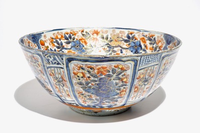 A Chinese clobbered blue and white kraak porcelain bowl with floral design, Wanli