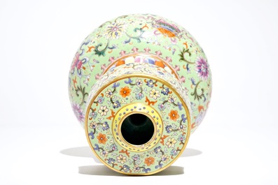 A Chinese famille rose on lime green-ground vase, Qianlong mark, 20th C.