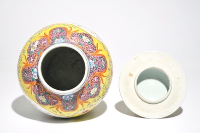 A Chinese famille rose baluster vase and cover with design of a flowervase, 19th C.