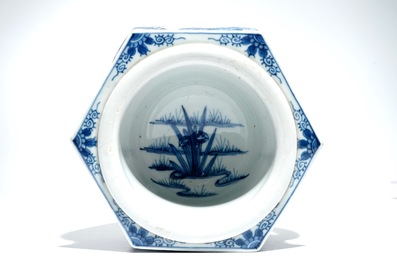 A Chinese blue and white hexagonal tea cup basin or kensui with prunus on cracked ice, Kangxi