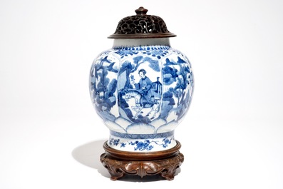 A Chinese blue and white globular vase with wooden cover and stand, Kangxi