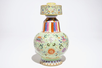A Chinese famille rose on lime green-ground vase, Qianlong mark, 20th C.
