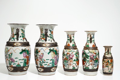 Two pairs of Chinese Nanking famille rose vases and a smaller one, 19/20th C.