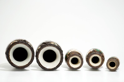 Two pairs of Chinese Nanking famille rose vases and a smaller one, 19/20th C.