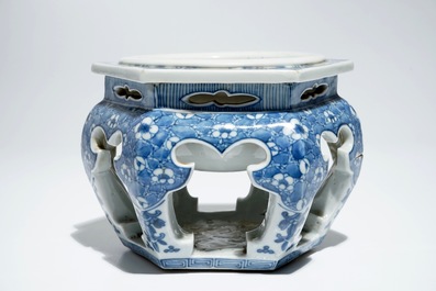 A Chinese blue and white hexagonal tea cup basin or kensui with prunus on cracked ice, Kangxi