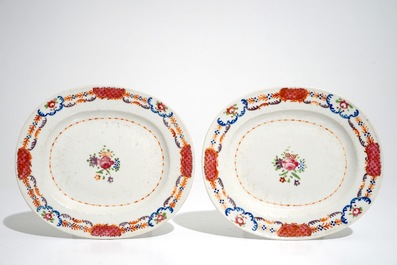 A pair of Chinese famille rose covered tureens on stands, Qianlong