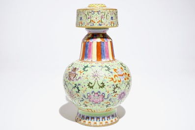 A Chinese famille rose on lime green-ground vase, Qianlong mark, 20th C.