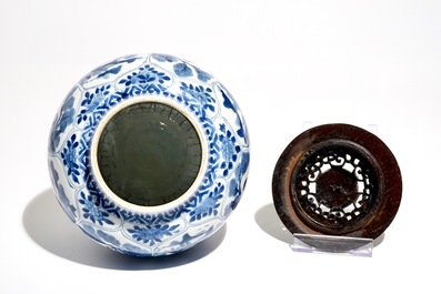 A Chinese blue and white globular vase with wooden cover and stand, Kangxi
