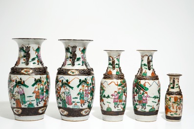 Two pairs of Chinese Nanking famille rose vases and a smaller one, 19/20th C.