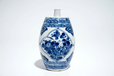 A Chinese blue and white barrel-shaped flask with floral design, Kangxi