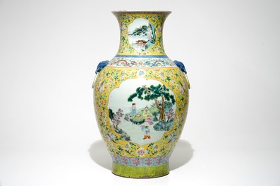 A tall Chinese famille rose yellow-ground vase with a tiger, Qianlong mark, 19th C.