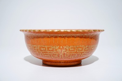 A Chinese coral-glazed and gilt bowl, Daoguang mark, 19th C.