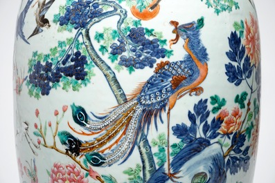 A very large Chinese famille rose vase with a peacock, 19th C.