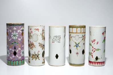 Five Chinese famille rose and qianjiang cai hat stands, 19/20th C.