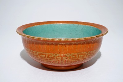 A Chinese coral-glazed and gilt bowl, Daoguang mark, 19th C.