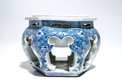 A Chinese blue and white hexagonal tea cup basin or kensui with prunus on cracked ice, Kangxi
