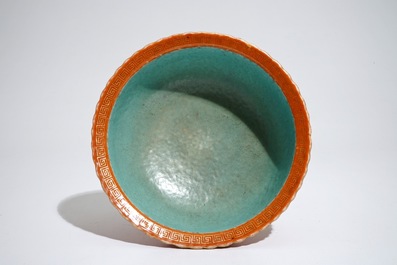 A Chinese coral-glazed and gilt bowl, Daoguang mark, 19th C.