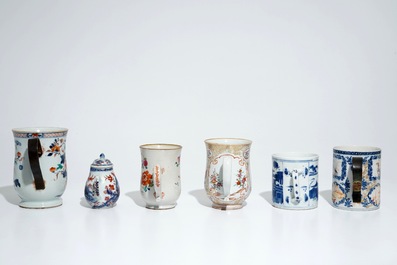 Five Chinese famille rose and blue and white mugs and a covered jug, mostly Qianlong