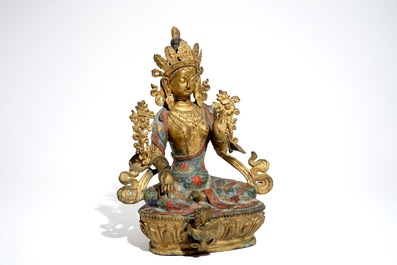 A large Chinese gilt bronze and cloisonn&eacute; figure of Green Tara, 19th C.